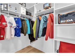 Walk in closet for the bedroom with the ensuite on the lower floor. - 