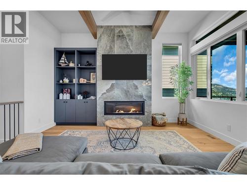 Living room. Main floor with 11 foot ceilings. - 3044 Shaleview Drive, West Kelowna, BC - Indoor Photo Showing Living Room With Fireplace