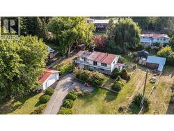 front of house and adjoining house for sale in back. - 