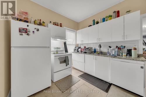 5464 Lewis Avenue, Niagara Falls (Clifton Hill), ON - Indoor Photo Showing Kitchen With Double Sink