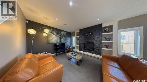 411 Flynn Lane, Saskatoon, SK - Indoor Photo Showing Living Room With Fireplace
