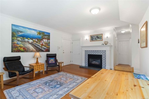 F-349 Foul Bay Rd, Victoria, BC - Indoor Photo Showing Living Room With Fireplace