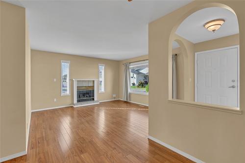 131-3400 Wilson Street, Penticton, BC - Indoor Photo Showing Living Room With Fireplace