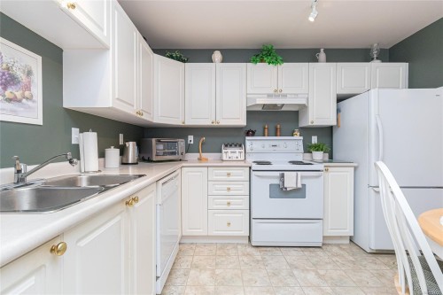 409-606 Goldstream Ave, Langford, BC - Indoor Photo Showing Kitchen With Double Sink