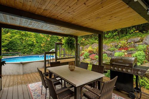 Patio - 2140 Ch. Du Grand-Héron, Sainte-Adèle, QC - Outdoor With Above Ground Pool With Deck Patio Veranda With Exterior