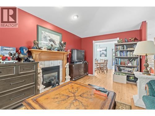 2039 Game Court, Armstrong, BC - Indoor Photo Showing Living Room With Fireplace