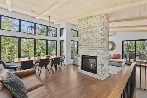 Vue d'ensemble - 31 Ch. De L'Altitude, Saint-Côme, QC - Indoor Photo Showing Living Room With Fireplace