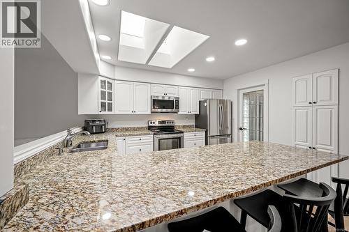 931 Crown Isle Dr, Courtenay, BC - Indoor Photo Showing Kitchen With Double Sink With Upgraded Kitchen