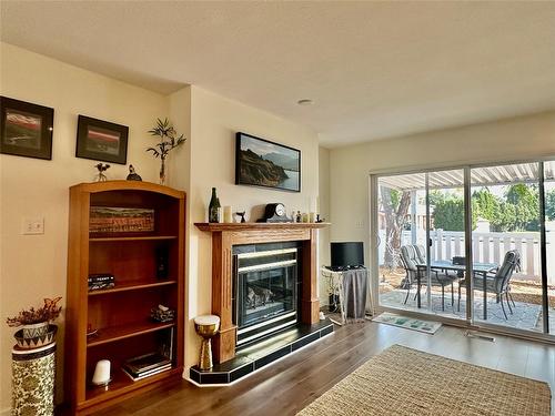 35-6446 Meadows Drive, Oliver, BC - Indoor Photo Showing Living Room With Fireplace