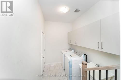 64 Phoenix Boulevard, Barrie, ON - Indoor Photo Showing Laundry Room