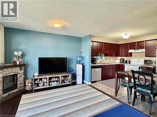 38 Max Becker Drive, Kitchener, ON - Indoor With Fireplace