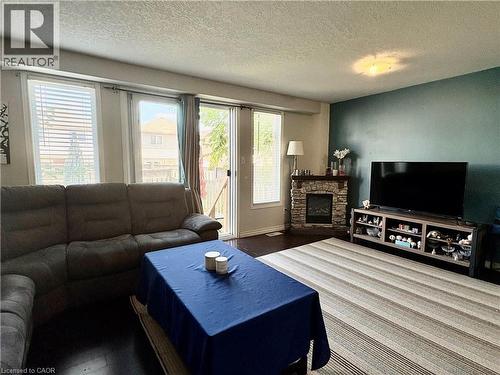 38 Max Becker Drive, Kitchener, ON - Indoor Photo Showing Living Room With Fireplace