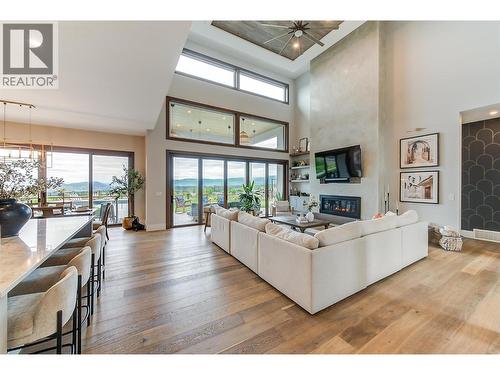 1612 Vincent Place, Kelowna, BC - Indoor Photo Showing Living Room With Fireplace