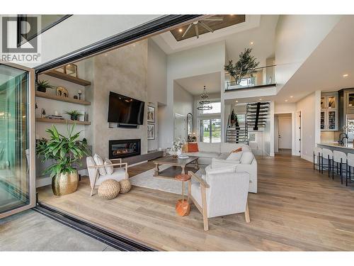 1612 Vincent Place, Kelowna, BC - Indoor Photo Showing Living Room With Fireplace