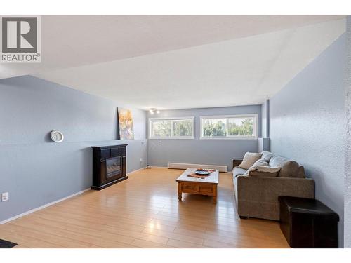 1525 Hollywood Road S, Kelowna, BC - Indoor Photo Showing Other Room With Fireplace