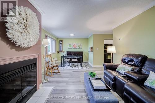 201 - 191 Lake Driveway W, Ajax, ON - Indoor Photo Showing Living Room With Fireplace