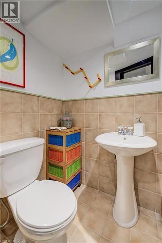 Bathroom featuring tile walls and tile patterned flooring - 85 Union Boulevard, Kitchener, ON - Indoor Photo Showing Bathroom