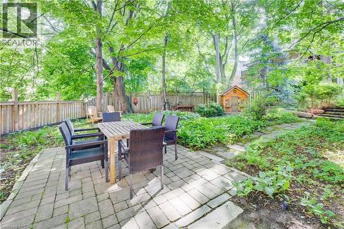 Fenced back yard with children's play house - 85 Union Boulevard, Kitchener, ON - Outdoor