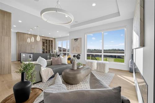 19 Ash Cove, Headingley, MB - Indoor Photo Showing Living Room