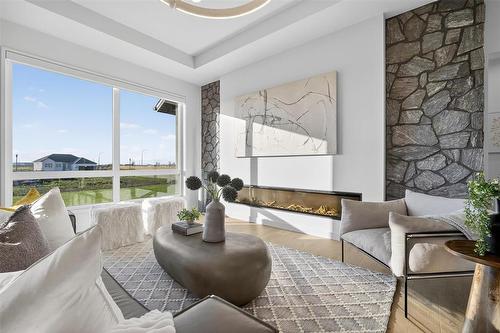 19 Ash Cove, Headingley, MB - Indoor Photo Showing Living Room