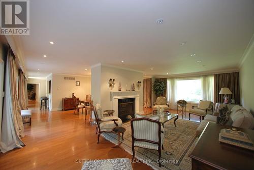 91 Forest Grove Drive, Toronto, ON - Indoor Photo Showing Living Room With Fireplace
