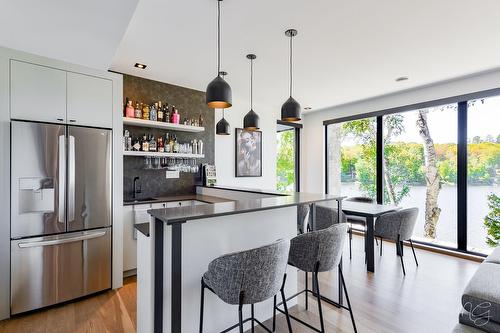Salle familiale - 140 Ch. Hunter, Saint-Hippolyte, QC - Indoor Photo Showing Kitchen