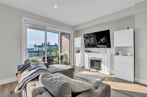 101-1001 Antler Drive, Penticton, BC - Indoor Photo Showing Living Room With Fireplace