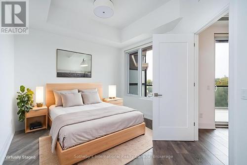 virtually Staged 2nd bedroom with own ensuite - 301 - 1 Hume Street, Collingwood, ON - Indoor Photo Showing Bedroom