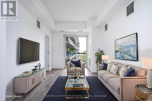 Living room Virtually staged - 301 - 1 Hume Street, Collingwood, ON - Indoor Photo Showing Living Room