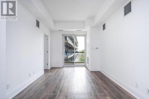 Patio doors to Large Balcony - 301 - 1 Hume Street, Collingwood, ON - Indoor Photo Showing Other Room