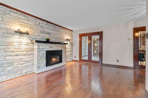 Salon - 3018 Rue William, Longueuil (Saint-Hubert), QC - Indoor Photo Showing Living Room With Fireplace