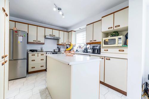 Cuisine - 1321  - 1327 Av. Stravinski, Brossard, QC - Indoor Photo Showing Kitchen