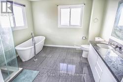 Ensuite Bathroom with Freestanding Soaker Tub - 
