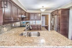 Kitchen with Granite Counters - 