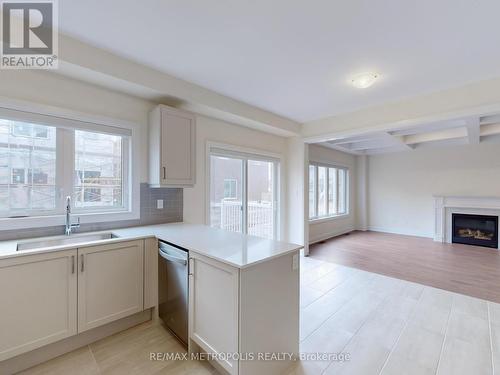 21 La Reine Avenue, Richmond Hill, ON - Indoor Photo Showing Kitchen With Fireplace