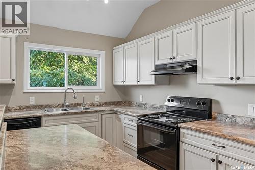 105 Main Street, Harris, SK - Indoor Photo Showing Kitchen With Double Sink
