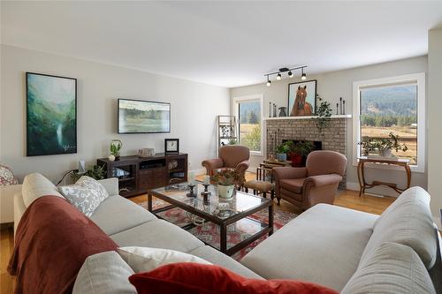 1258 Round Lake Road, Spallumcheen, BC - Indoor Photo Showing Living Room With Fireplace