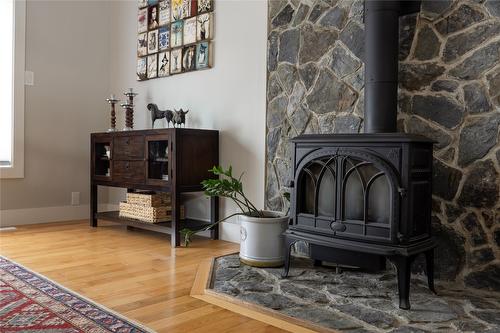 1258 Round Lake Road, Spallumcheen, BC - Indoor With Fireplace