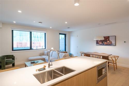 1111-1702 Coursier Avenue, Revelstoke, BC - Indoor Photo Showing Kitchen With Double Sink