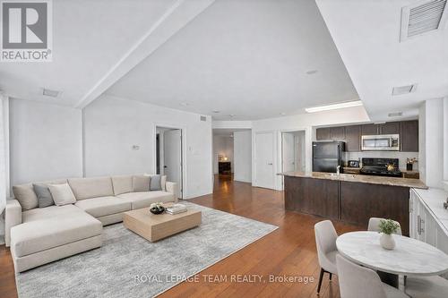 Virtually Staged - 401 - 234 Rideau Street, Ottawa, ON - Indoor Photo Showing Living Room