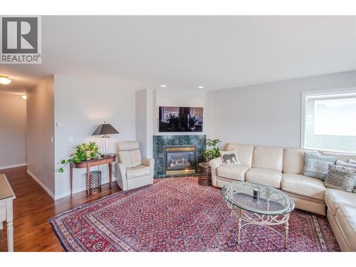 11702 Golf Course Drive, Osoyoos, BC - Indoor Photo Showing Living Room With Fireplace