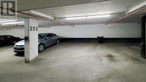 605 - 200 Robert Speck Parkway, Mississauga, ON - Indoor Photo Showing Garage