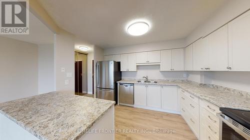 605 - 200 Robert Speck Parkway, Mississauga, ON - Indoor Photo Showing Kitchen With Stainless Steel Kitchen With Double Sink