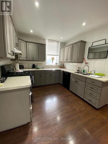 main floor kitchen - 103 Victoria Avenue S, Hamilton, ON - Indoor Photo Showing Kitchen With Double Sink