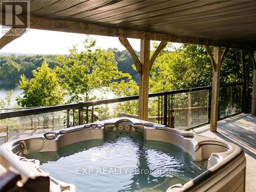 1047 Whyman Road, Algonquin Highlands, ON - Outdoor With Body Of Water With Deck Patio Veranda With Exterior
