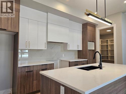 757 Barnaby Road Unit# 3, Kelowna, BC - Indoor Photo Showing Kitchen With Double Sink