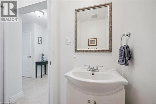 Bathroom featuring vanity and light tile patterned flooring - 599 Beechwood Drive, Waterloo, ON - Indoor Photo Showing Bathroom