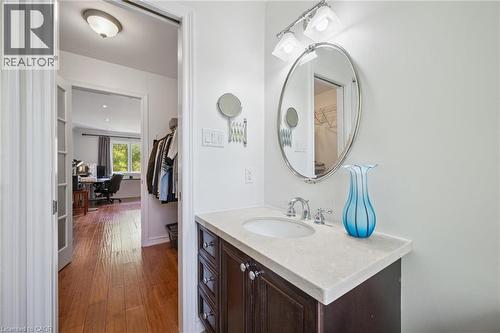 Bathroom featuring vanity and dark wood finished floors - 599 Beechwood Drive, Waterloo, ON - Indoor Photo Showing Bathroom