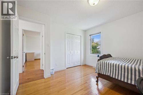 Bedroom featuring light wood-style floors and a closet - 599 Beechwood Drive, Waterloo, ON - Indoor Photo Showing Bedroom