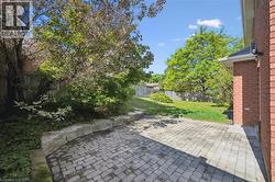 Fenced backyard with a patio area - 